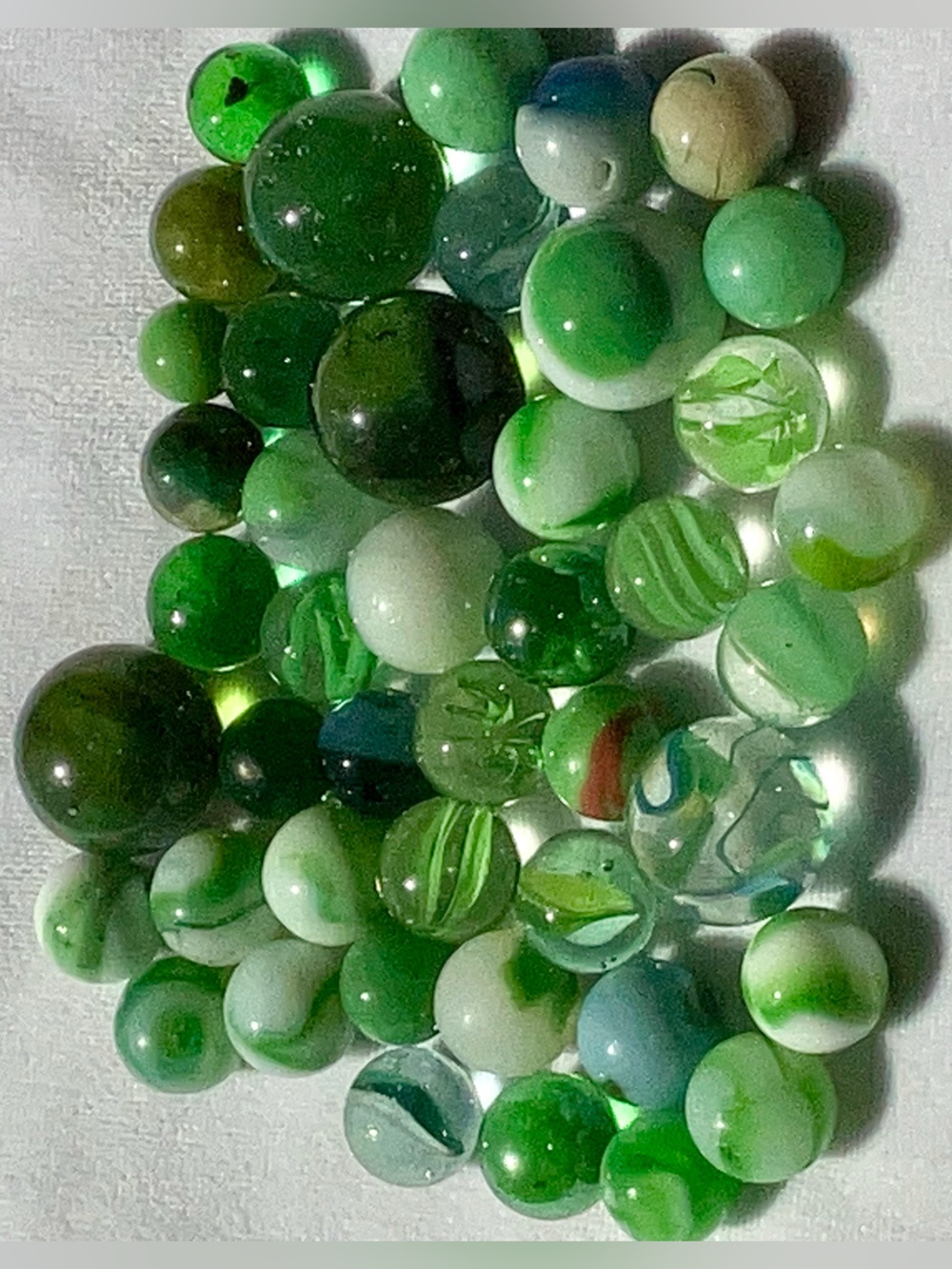 Vintage 44 pc collection of GREEN glass marbles